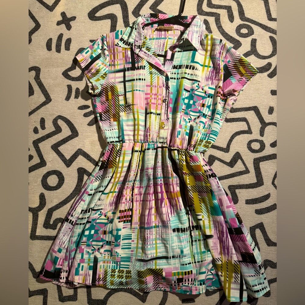 Multi color pleated dress.